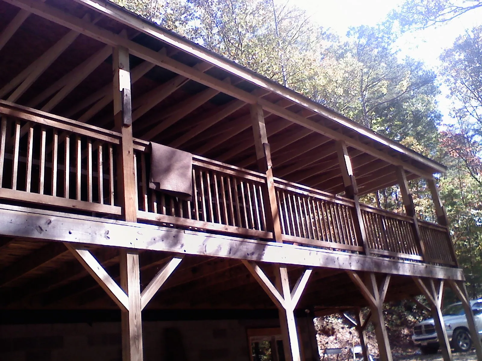 Timber framing under a new elevated porch and deck — Roof Leak Repair in Granger by Roofing Brothers